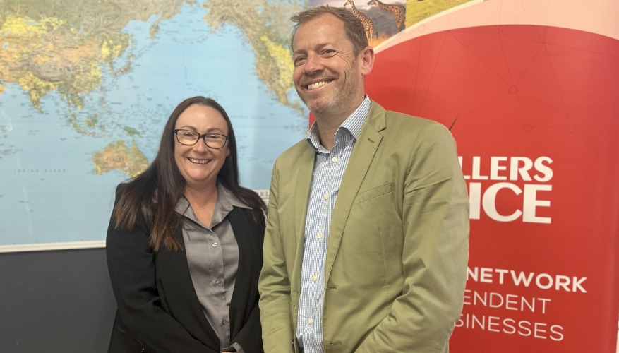 Au Revoir Travel and Cruise owner Sam Gallaher with Travellers Choice Business development Manager Tim Bolton Au Revoir Travel and Cruise owner Sam Gallaher with Travellers Choice Business development Manager Tim Bolton